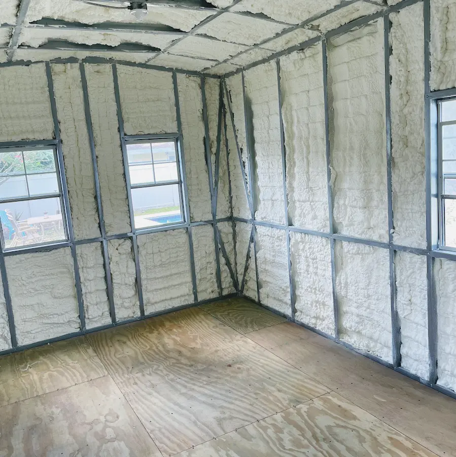 Closed-cell spray foam insulation applied to wall cavities in a residential project in Lochbuie